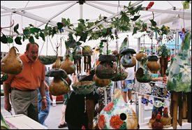 Shopping in a tent the Main Street Festival in downtown Franklin, TN, enjoy arts and crafts, vendors, entertainment, great food & drink, and fun for the entire family in historic downtown Franklin. 