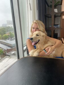 Woman with her dog, dog friendly hotels Franklin & Nashville, TN.