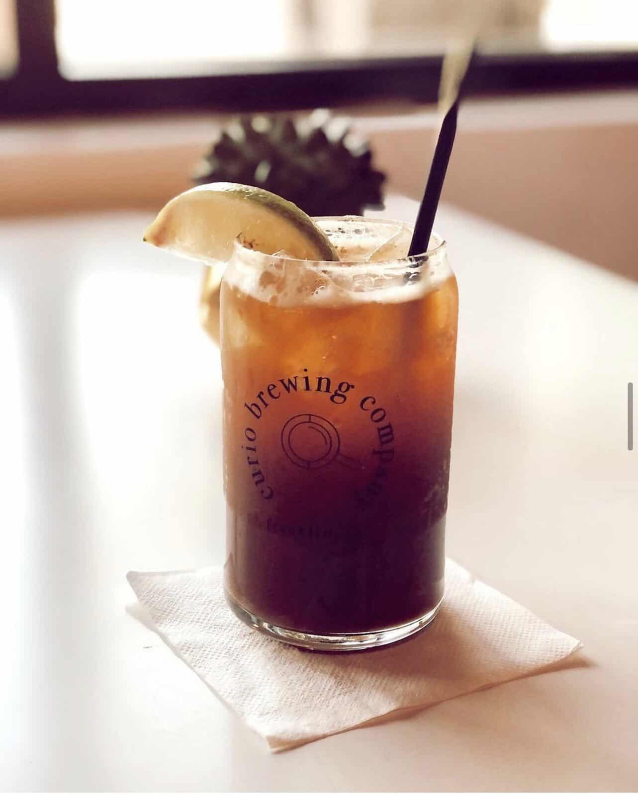 A drink by Coffee + Beer Taproom in Franklin - Curio Brewing.