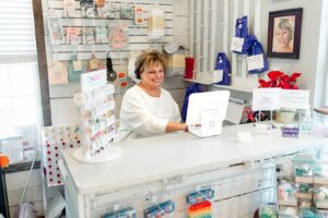 Purple Butterfly interior, downtown Franklin, TN children’s boutique, shop apparel, gifts, shoes, toys, bows, and more.