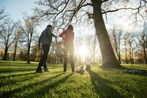 Family playing in the park in Franklin, Tennessee.