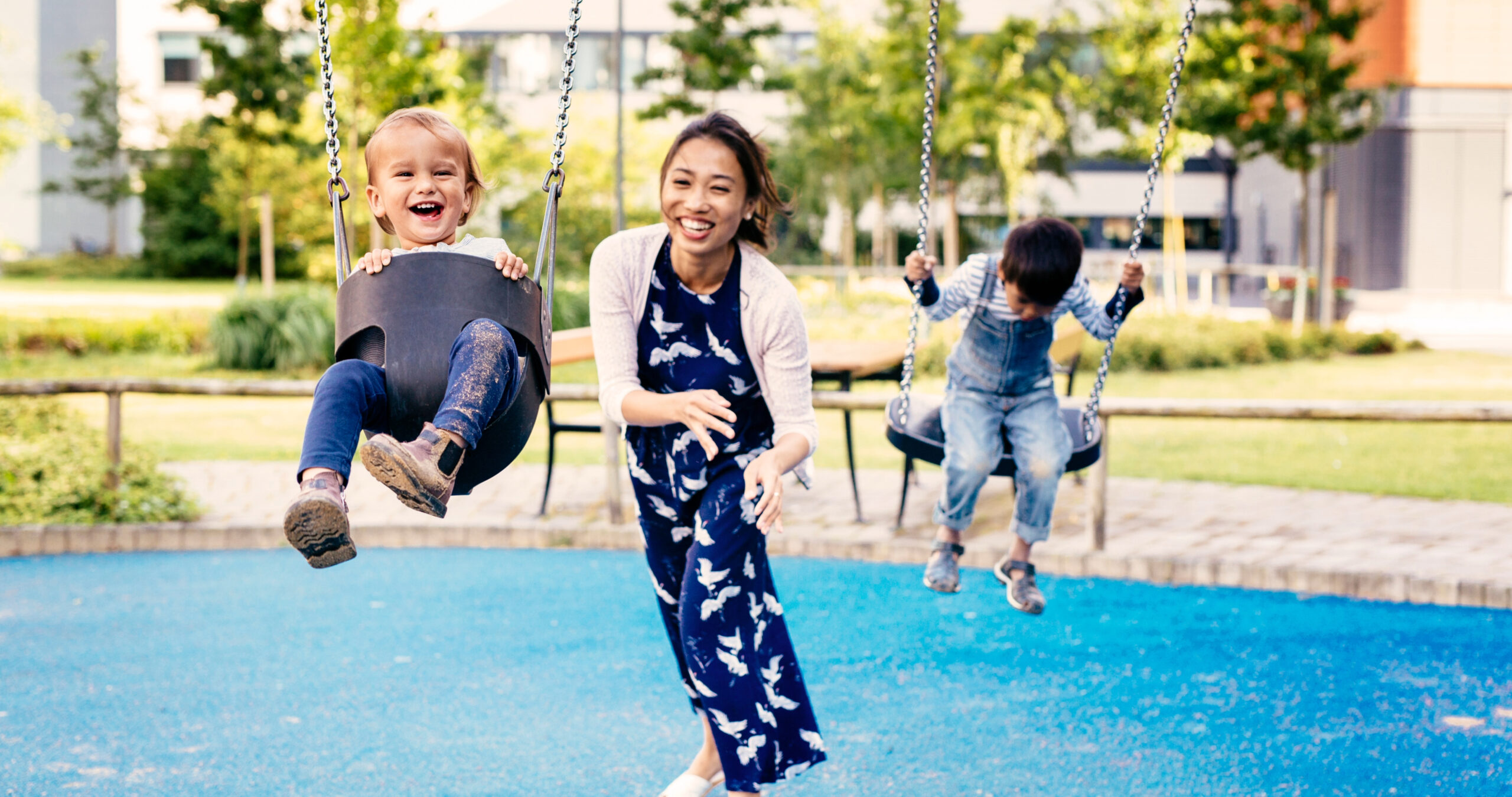 Mother playing with son at playground in Franklin, Tennessee.