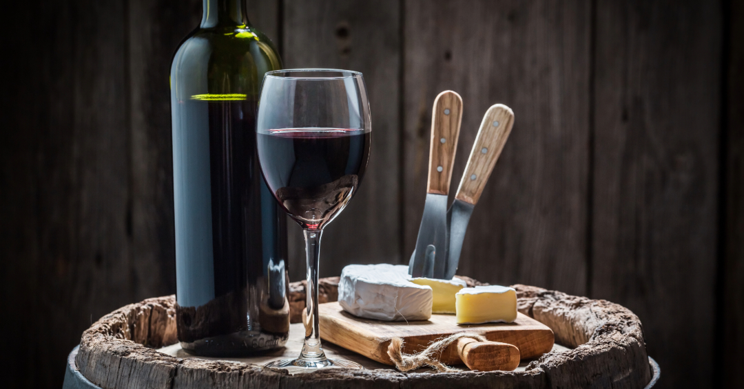 Wine in a glass at a wine bar in Franklin, Tennessee, red wine cheese and accompianments.