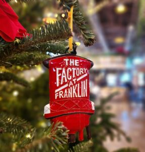 The Factory at Franklin Holiday Events in Franklin in December_custom Kitty Keller holiday ornaments depicting the iconic Factory Water Tower available for purchase at The Skylight Bar for $35.99/ea.