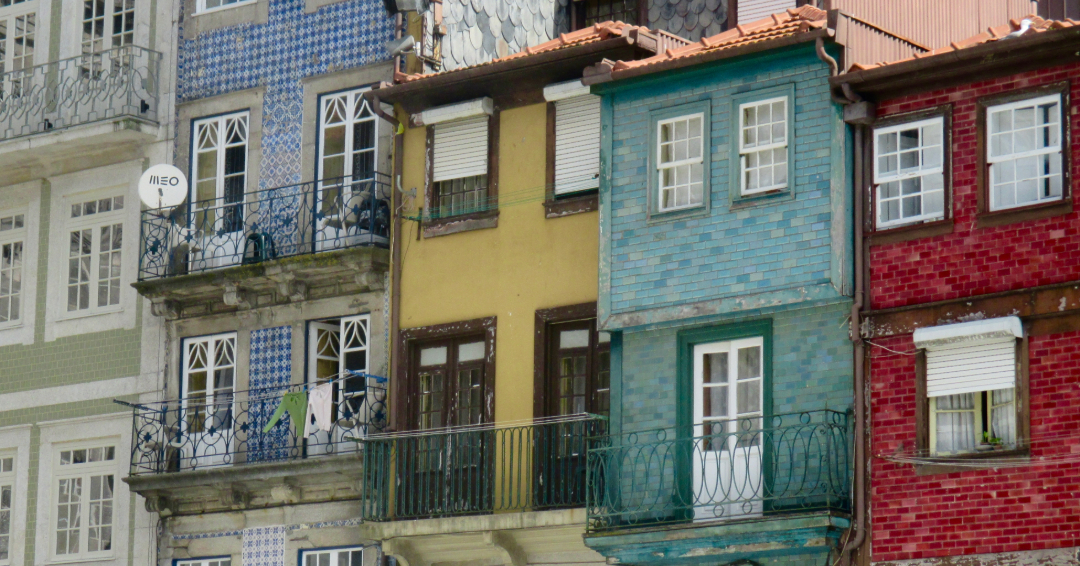 A row of tile-covered buildings in the City of Porto, Portugal.