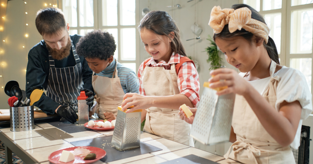 Kids at a summer cooking camp in Williamson County, TN, learning to cook and bake.