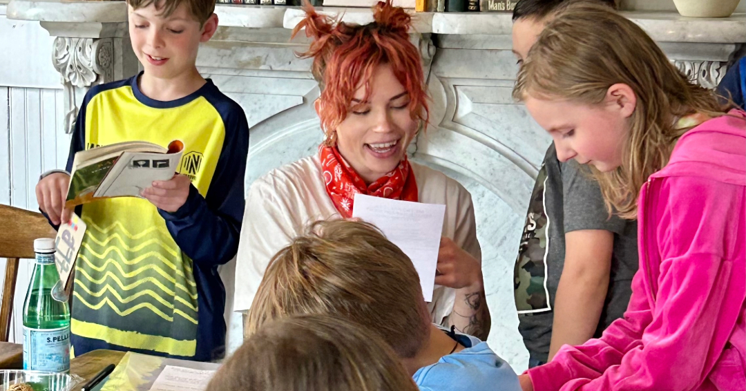 Anna Skates, a children's author and advocate, is pictured at book club with a group of kids in Franklin, Tennessee.
