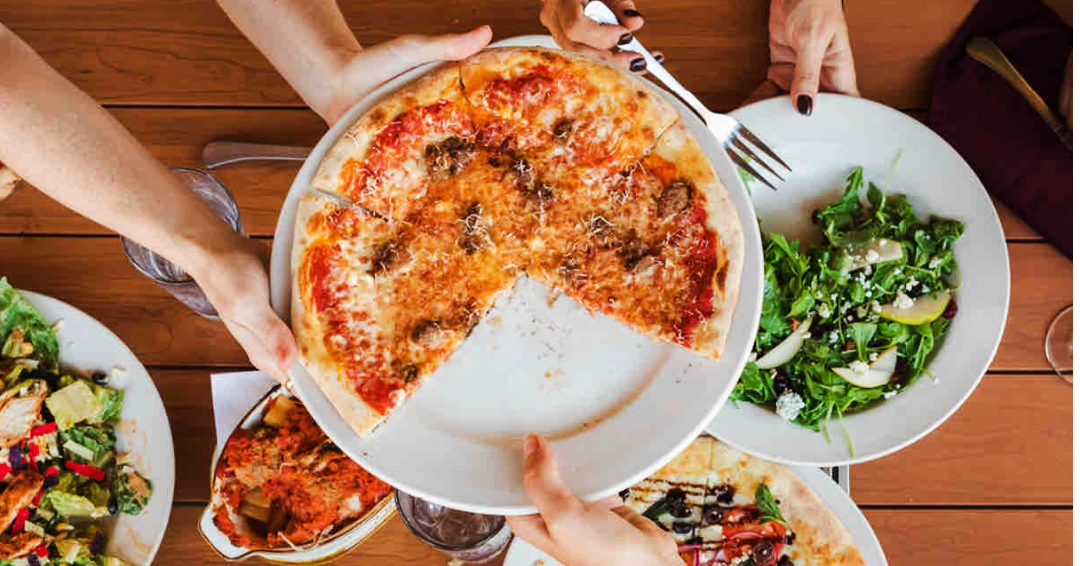 Sharing a meal at Brixx Wood Fired Pizza in Franklin, Tennessee. Happy Hour with friends.