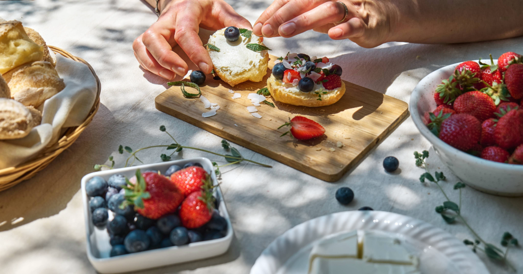 Desserts at a summer cookout with fresh blueberries and strawberries. 