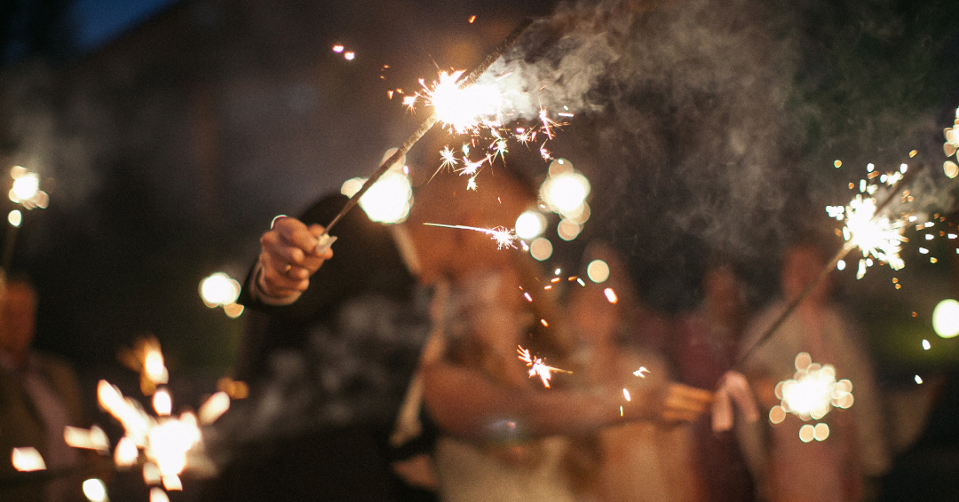 A newlywed couple holds sparklers at their wedding in Williamson County, Tennessee.