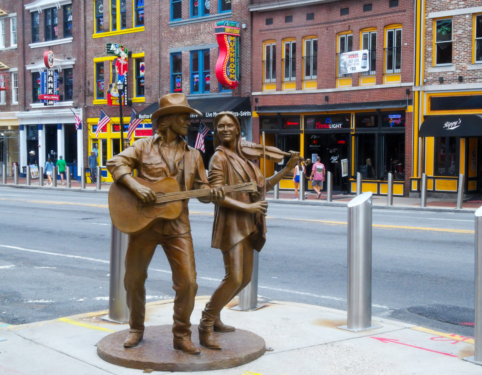 Statues "Music City Heroes" on Broadway in Nashville, Tennessee: home of history, Honky Tonks, and hidden gems.