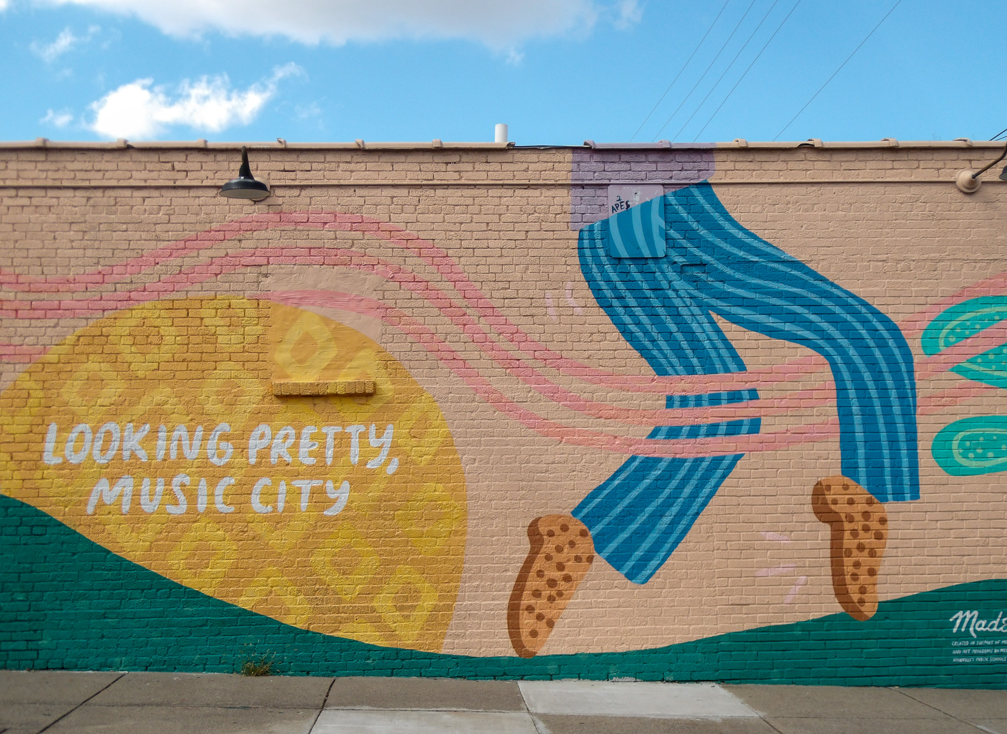 A mural in 12 South Nashville that is a popular spot to take photos, a photo worthy mural for pictures with friends, selfies, and social media.