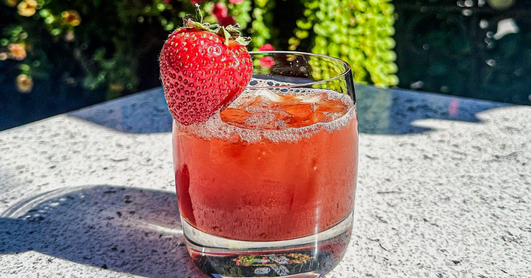 A seasonal cocktail at Mere Bulles Restaurant & Events in Brentwood, Tennessee, where happy hour cocktails are $11.