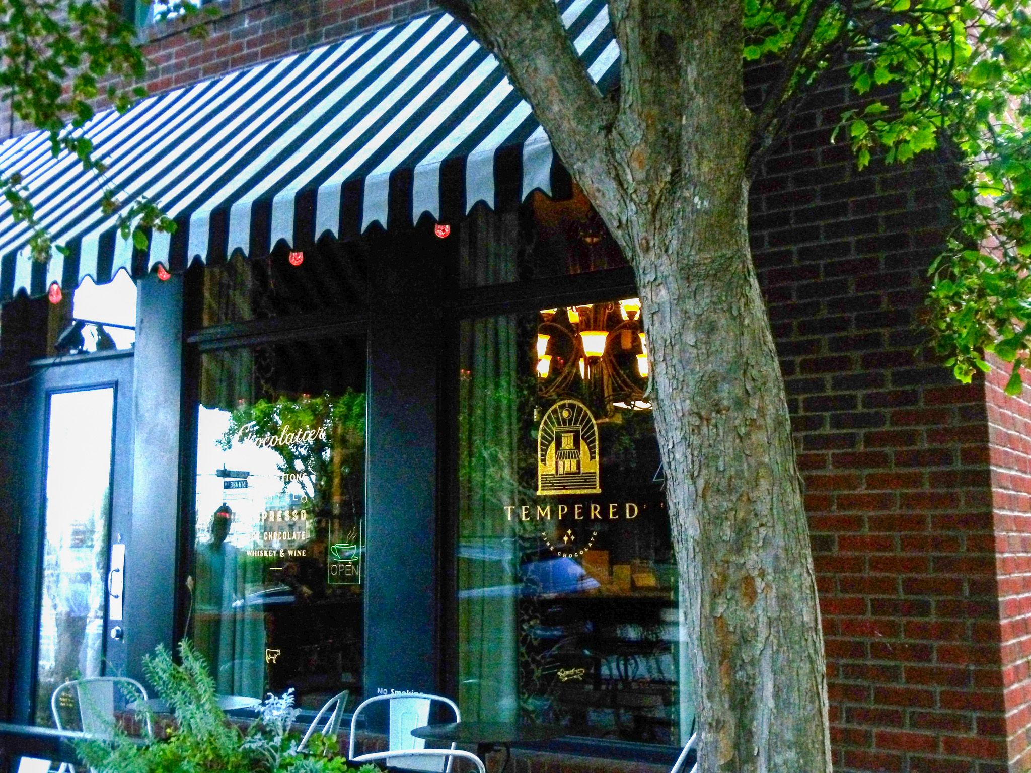 Tempered Fine Chocolate and Green Light bar is a destination in Nashville, Tennessee's Germantown neighborhood that doubles as a gourmet chocolate shop and an absinthe bar.