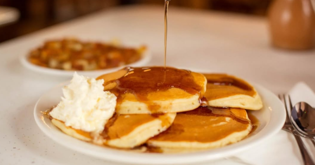 Syrup is poured on a stack of pancakes at Stacked Express in Cool Springs Galleria. 