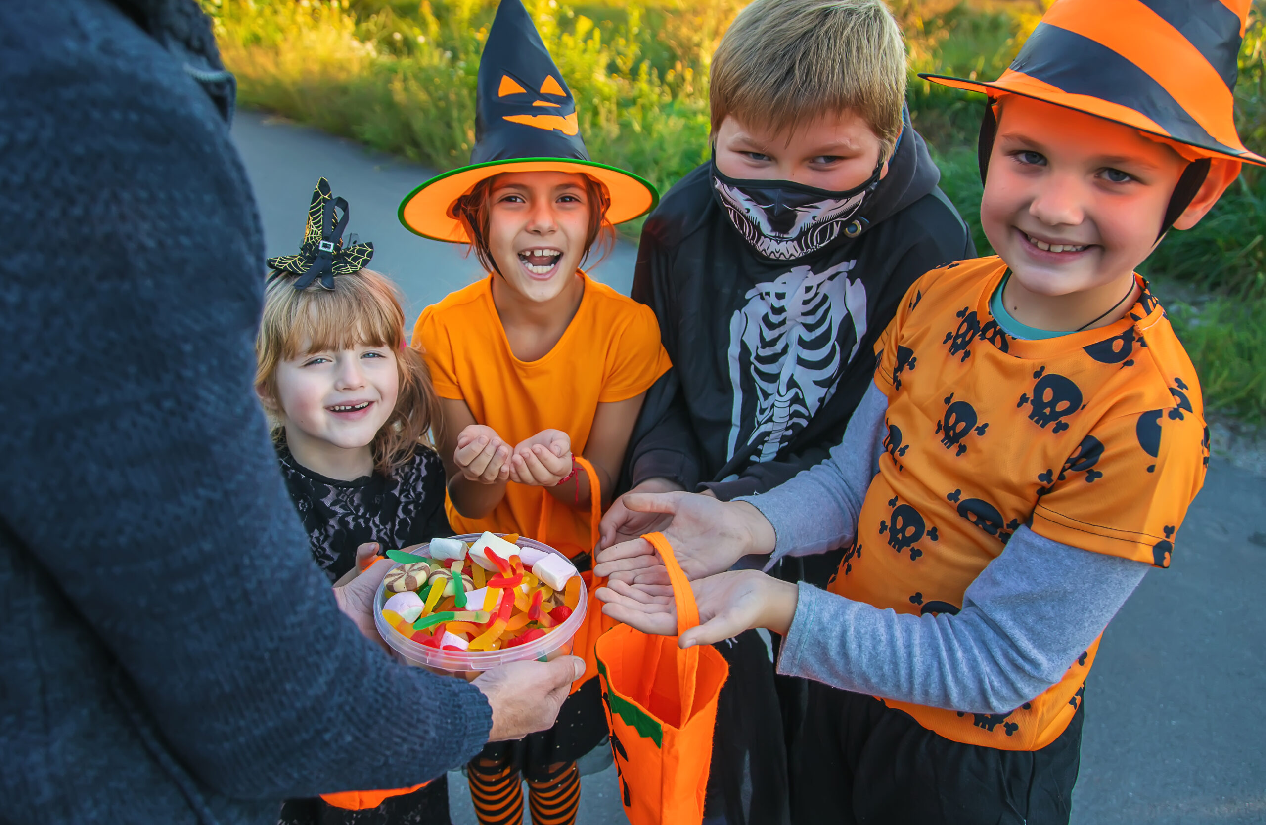 Children trick or treating in Franklin, TN, wearing Halloween costumes.